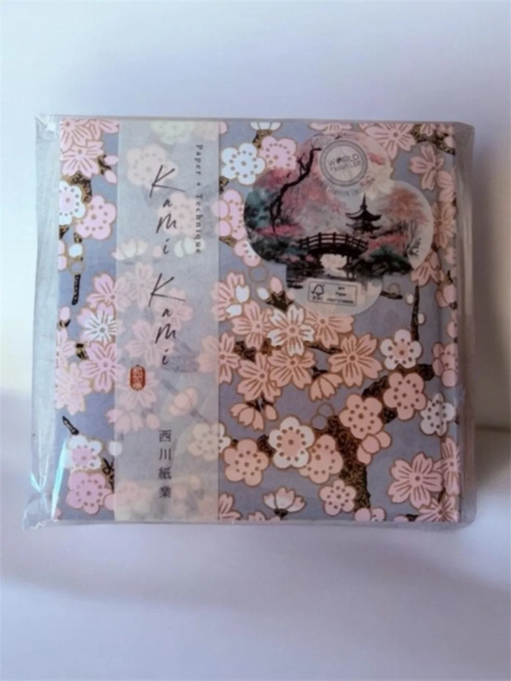 Japanese notebook or journal featuring a cherry blossom (Sakura) pattern